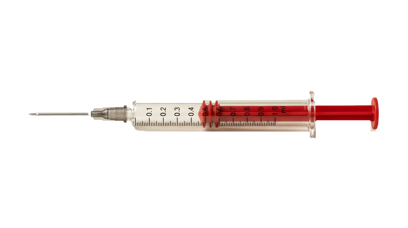 AI-DISPO UltraFlow syringe horizontal studio photography with red plunger and clear barrel